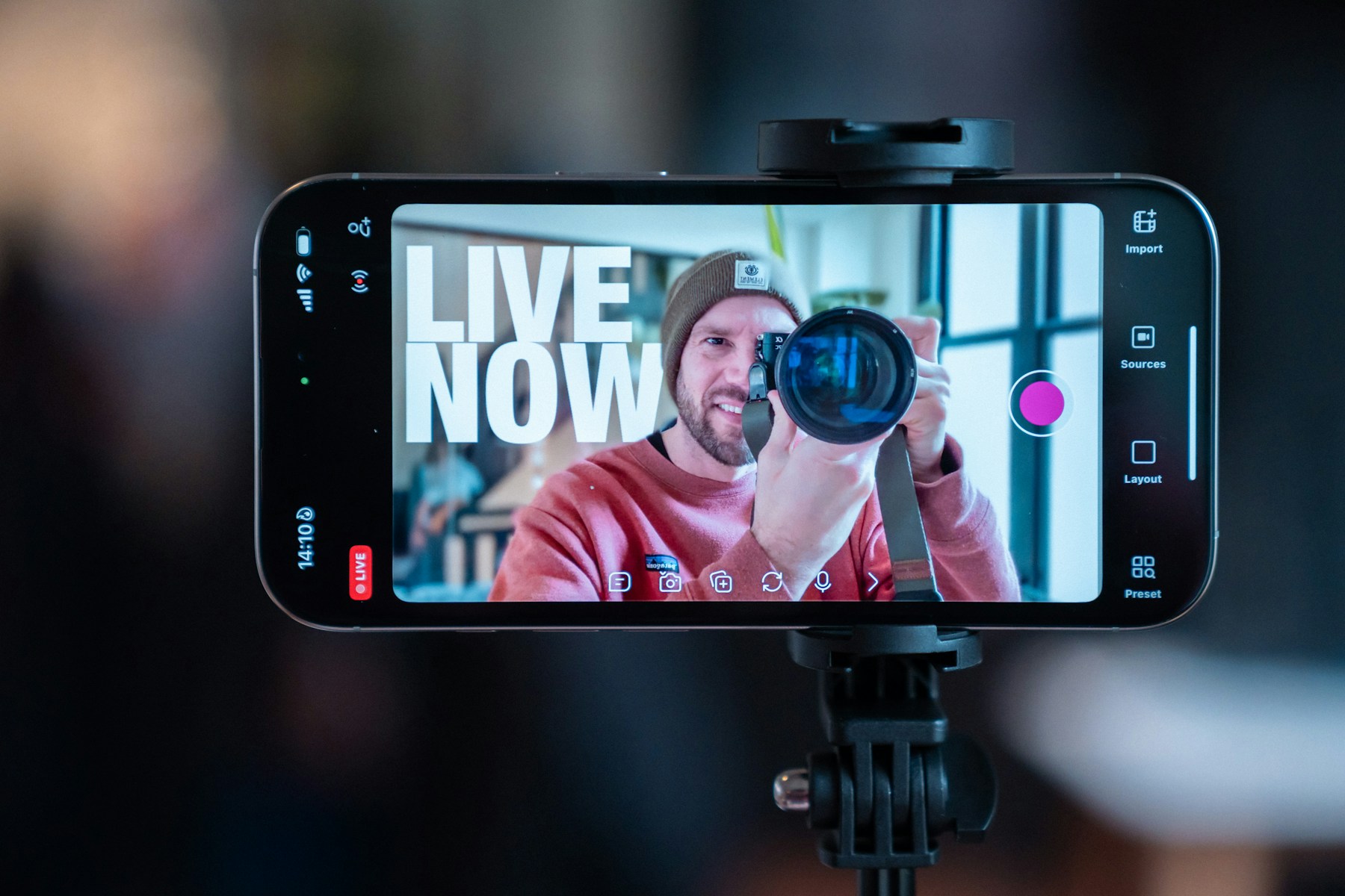 A phone mounted for a TikTok LIVE creator setup.
