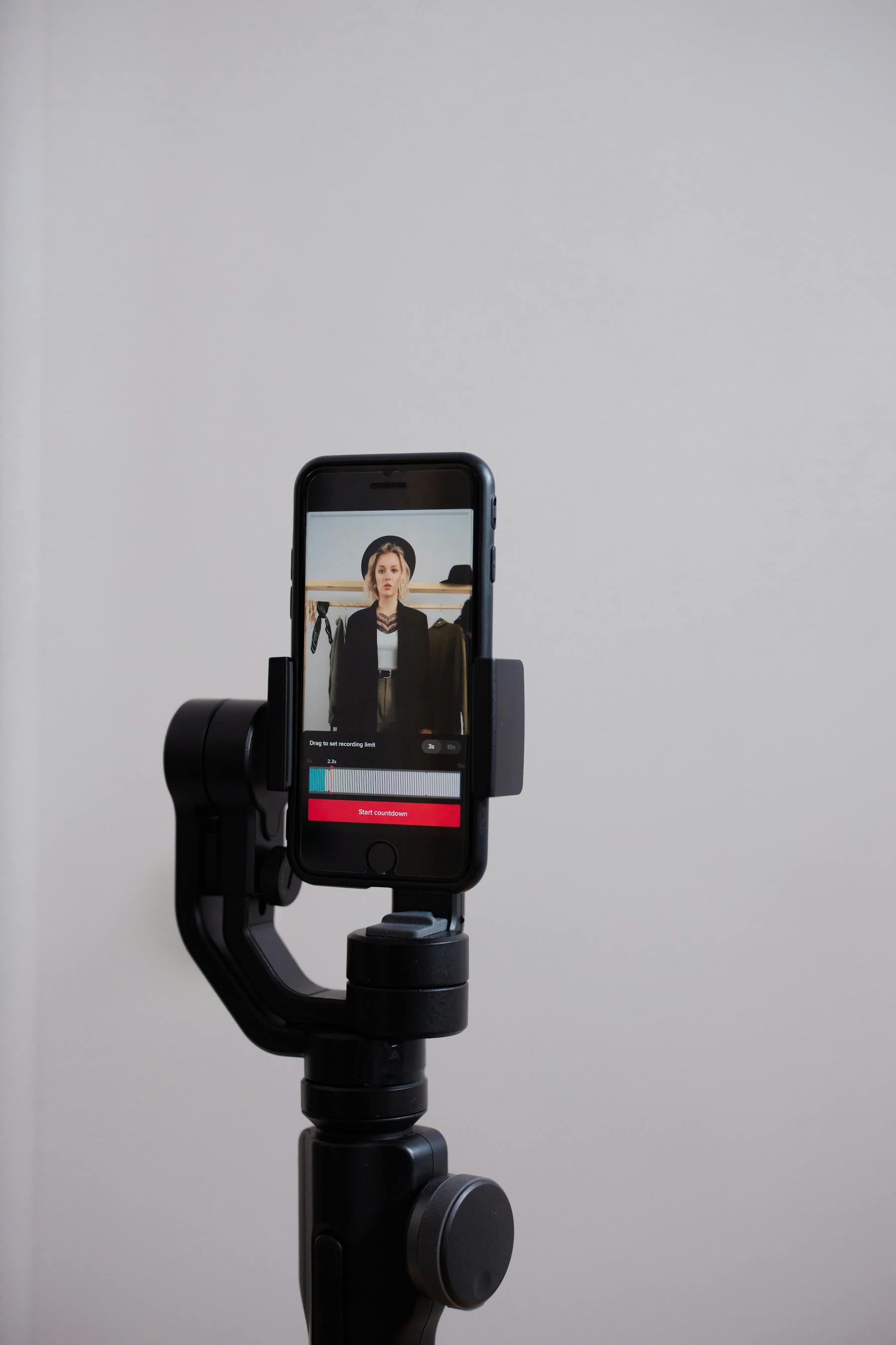 A phone mounted for a creator recording session.
